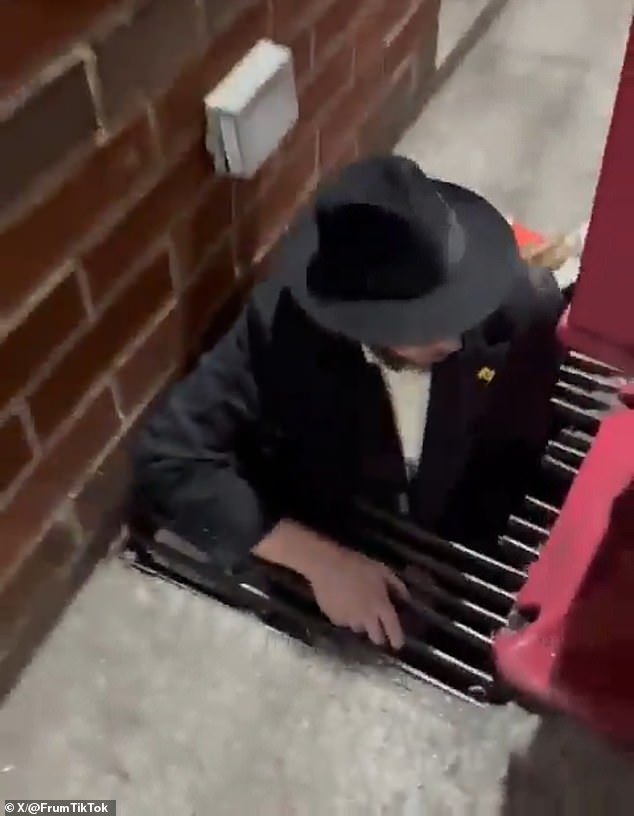 Seven men emerge from open manhole in Brooklyn street